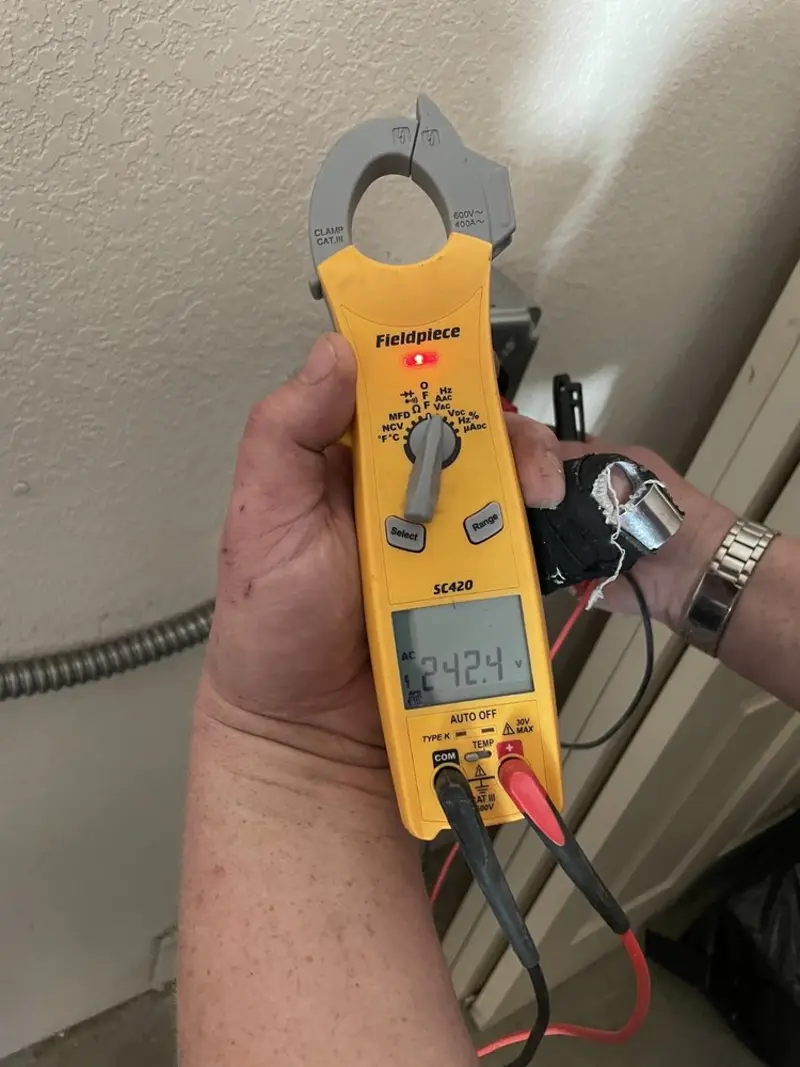 Voltage testing with clamp meter during Whole House Surge Protector in Paoli